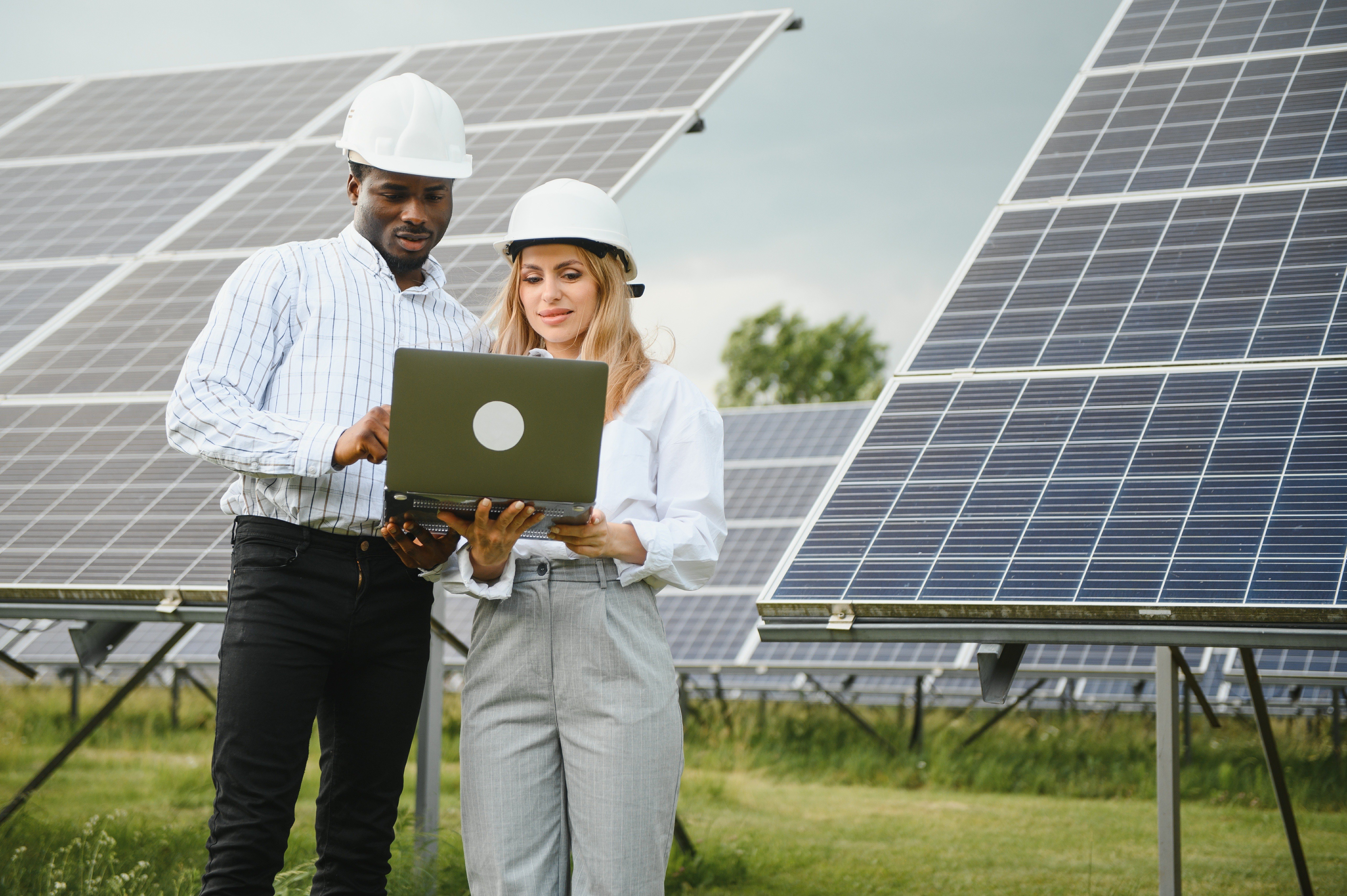 male-and-female-engineers-worker-working-in-solar-2024-07-31-21-43-47-utc